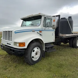 1999 International 4700 Single Axle Flat Deck Truck; SN.1HTSCABM4XH690355