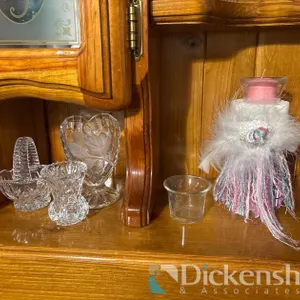 DECOR AND CANDLE HOLDERS ON BED FRAME