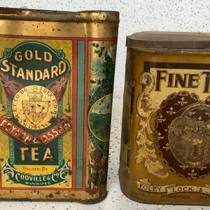 Two Winnipeg Tea Tins