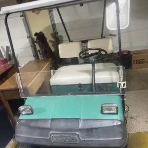 Electric EZ-Go golf cart with charger