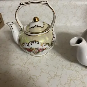 Three ceramic tea pots
