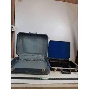 Blue Suitcase 21"x15"x8", Black Briefcase 17"x13"x4" ( cannot ship, as is)