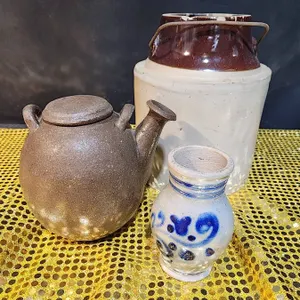 Brown Jug, Cast Teapot, and Painted Vase