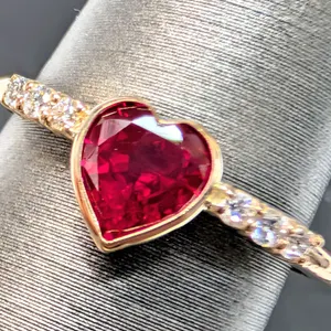 10K(1.5G), LAB RUBY (1.15CT), LAB DIAMOND (0.05CT) RING, SUGGESTED RETAIL VALUE $2400