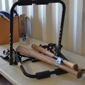 2 Wooden Baseball bats - Bicycle rack