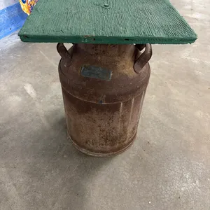 Chair/cream can with brass tag from Rolla