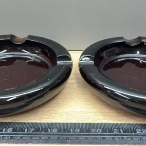 Pair of 8” diam Brown Glass Ashtrays.  *Important