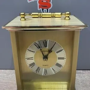 President Brass Quartz Clock. Germany. 4.5”H.