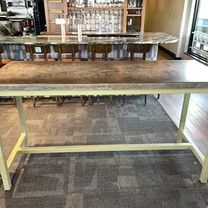 heavy duty bar height table with 2” thick concrete slab top and welded metal frame