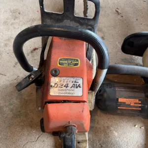 Stihl 024 AV gas chainsaw and a Remington 3.0 electric chainsaw with a 16-inch bar. Both chainsaws a