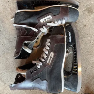 Pair of size 8 skates. The skates are suitable for ice use and are designed for performance and comf