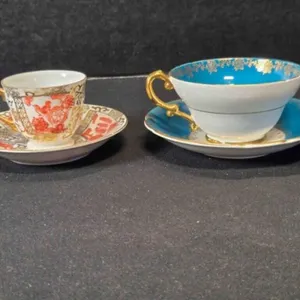 2 teacups & saucers; Imari Japan, 2�" at mouth