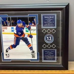 Framed Photo & Stats of Mathew Barzal. 18.5”W x