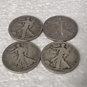 4-WALKING LIBERTY HALVES 90% SILVER