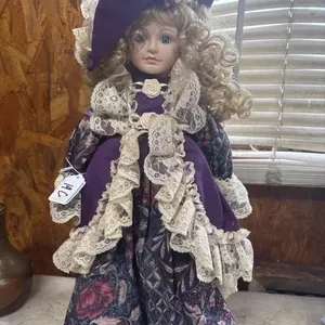 Porcelain doll purple blonde