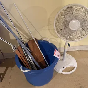Floor fan and feet bucket with curtain rod items