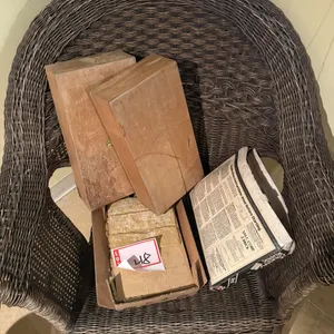 Wicker chair and wooden boxes