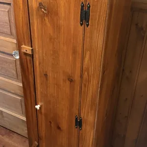 Cabinet with shelves, 19 x 11 x 57”