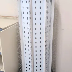 Poly rotating sunglasses merchandise rack. Features clear plastic arms, mirrors at the top, and a sign holder. 68"H. Mounted on a round black base. Su