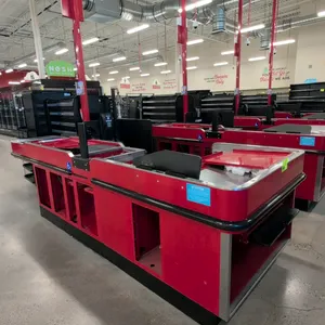 2023 Royston UL-6-55-LH-1 single belt check lane. Features a baggage stand, red finish, and black bumper guards. Includes anti-fatigue mat and small p