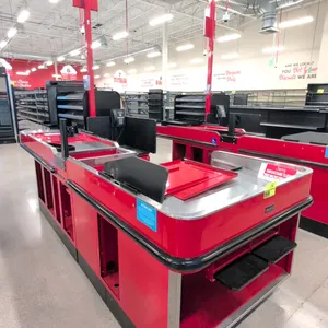2023 Royston UL-6-55-LH-1 single belt check lane with baggage stand. Features a red finish, black bumper guards, and stainless steel top surfaces. Inc