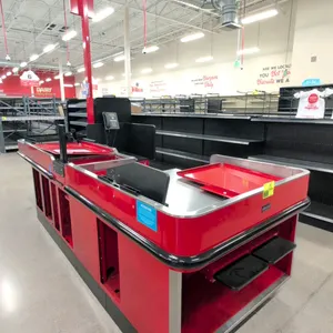 2023 Royston UL-6-55-LH-1 single belt check lane with baggage stand. Features a red finish, black bumper guards, and stainless steel top surfaces. Inc
