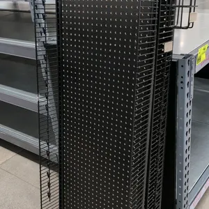 Metal pegboard merchandise rack. Features a black finish, pegboard backing, and wire side panels. 22"W x 6"D x 60"H.
