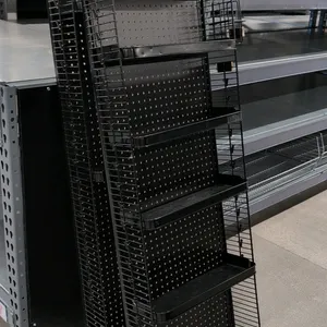 Metal pegboard merchandise rack. Features a black finish, pegboard backing, wire side panels, and adjustable shelf trays. 22" x 6" x 60".