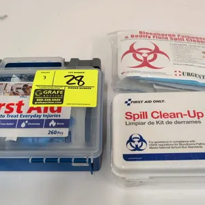 Assorted first aid and spill clean-up kits. Includes (1) First Aid Only 91248 260-piece first aid kit in a hard plastic case, (1) First Aid Only 6021 