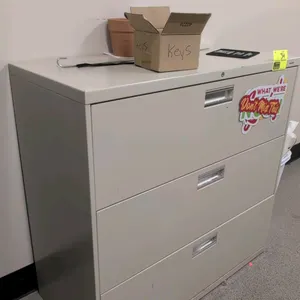 Hon metal 3-drawer lateral filing cabinet. 42"W x 19"D x 41"H. Contents not included.