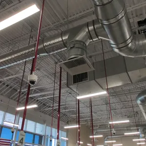 Vandal proof dome network security camera. Features ceiling mount design. Uninstalled camera mount boxes visible in photos.