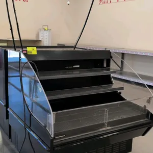 2022 Hussmann Q3-SSM-4S self-contained open-air display case. Features 2 clear shelves, clear acrylic sides, and a digital temperature display. 4'L. S