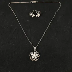 Vintage Mikimoto Pearl Necklace and Earrings