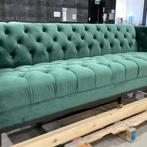 FOREST GREEN COUCH WITH BLACK/GOLD LEGS
