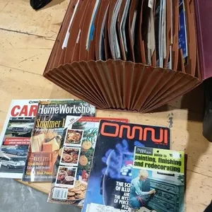 File folder with assorted vintage magazines
