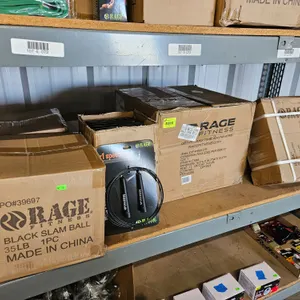 Shelf of New Fitness Equipment: Speed Ropes, 35lb Slam Balls, 12" Steel Plyo Box, 36lb Weighted Vest