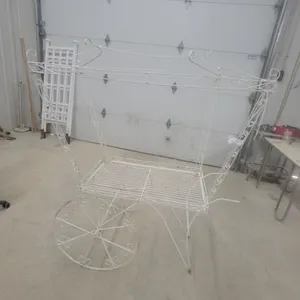 White Wrought Iron Decorative Planter Cart with Spoked Wheels and Scrollwork