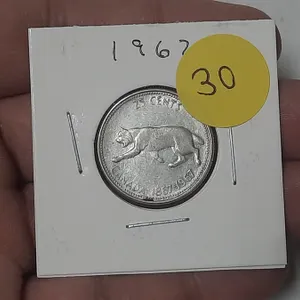 1967 Canada Silver 25 Cents.