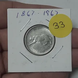 1967 Canada Silver 25 Cents.