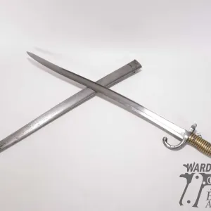 French model 1866 Chassepot bayonet w/ matching numbers scabbard. Brass handle, 22 3/4" carved blade