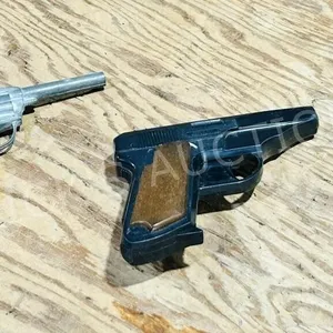 pair of vintage toy pistols - as is