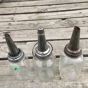 3 oil bottles with spouts