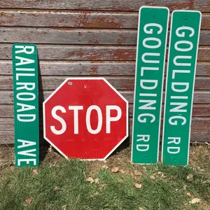 Stop sign plus 2 street signs