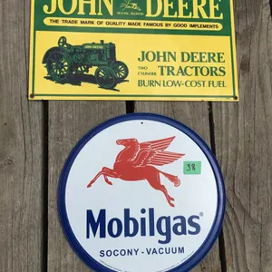 John Deere and Mobil gas signs