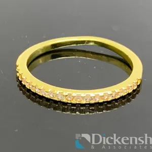 Gold Tone Wedding Band With Clear Stones