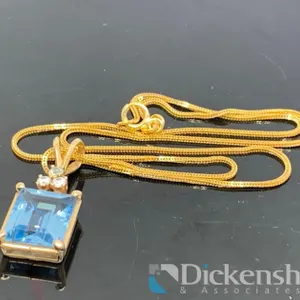 14KT Yellow Gold Necklace With a Blue Stone Pendant 4.9 Grams