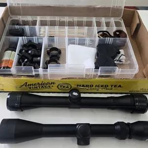 2 scopes including Bushnell rimfire 4x32 and a Dead Ringer 3-9x40 plus a plastic case with assorted 