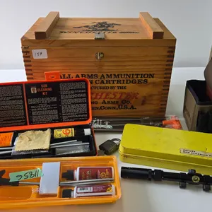 Wooden Winchester ammo box with 4 assorted cleaning kits, a Bushnell sportview 3-7x20 scope with mou