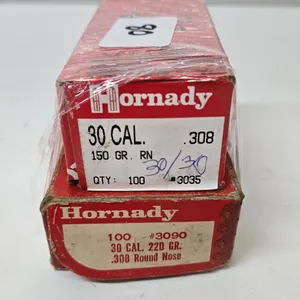 Two boxes Hornady .30 cal including a 56 count box of .220 gr round nose and a 150 gr round nose