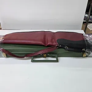 One vintage 50" hard rifle case and a 52" soft case
